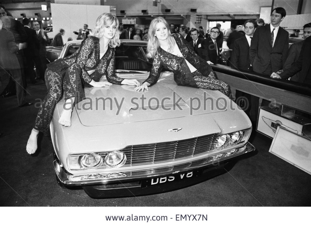 models-drapped-over-the-bonnet-of-an-aston-martin-dbs-v8-at-the-1969-E.jpg